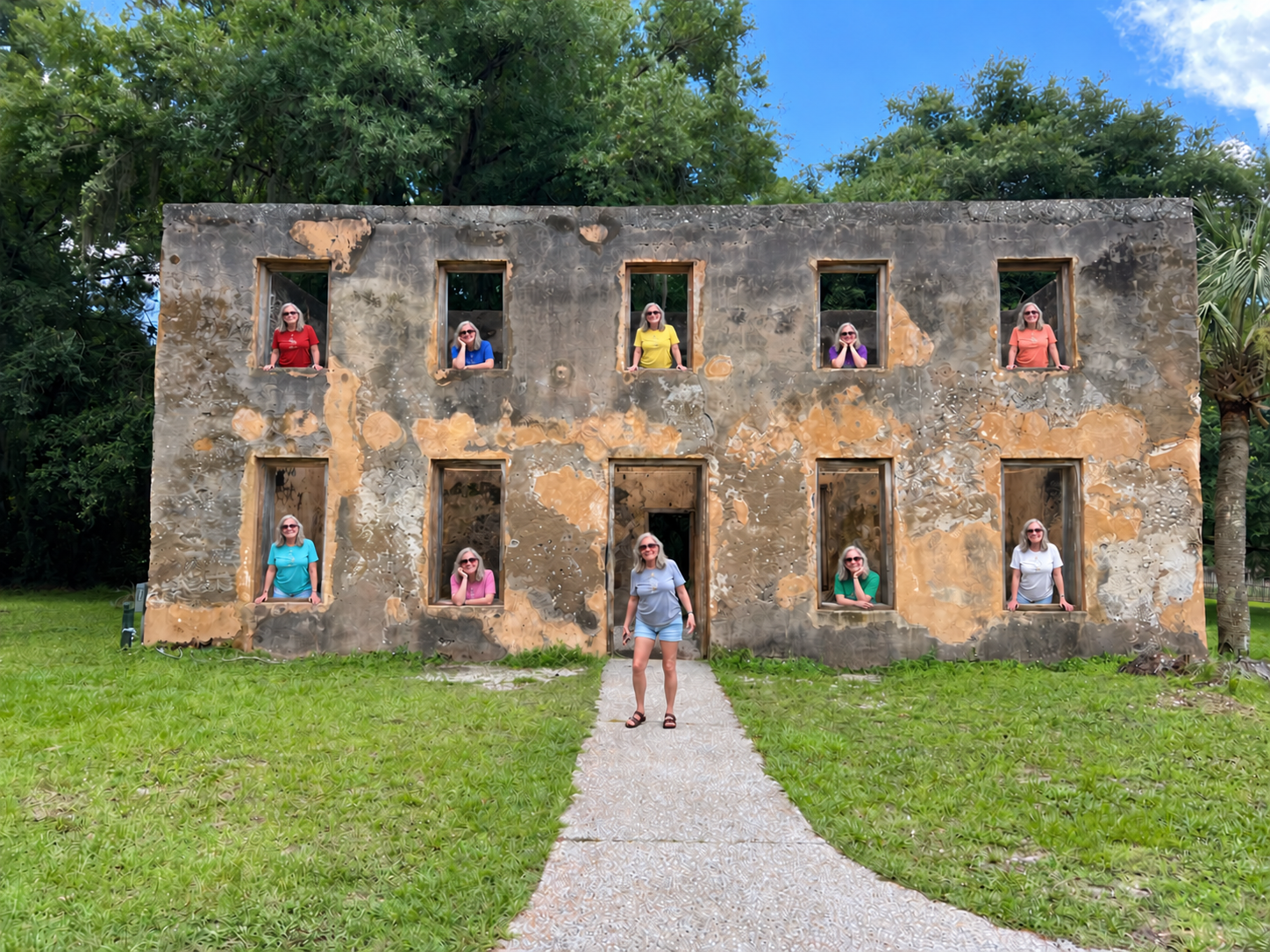 Horton House on Jekyll Island, with denise appearing in each window in a different colored shirt and standing in the doorway.